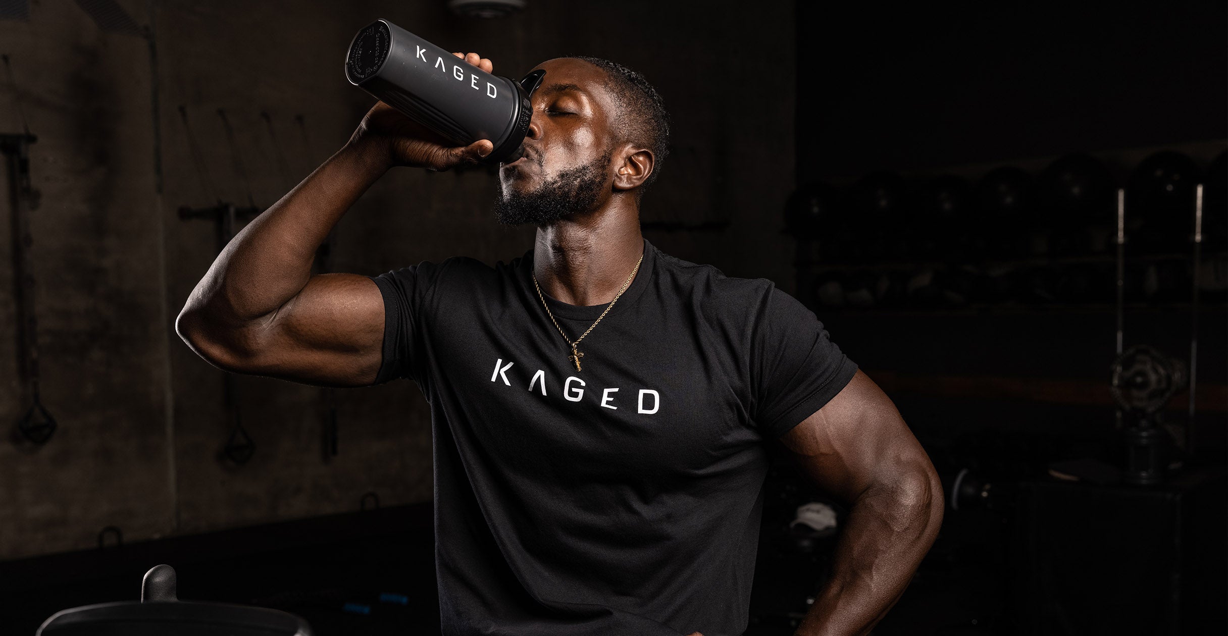 Make Kaged athlete drinking from bottle